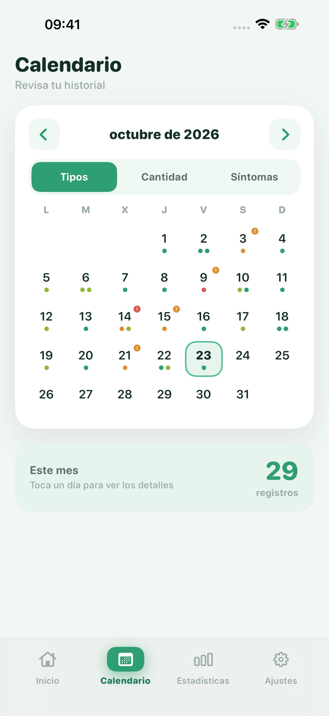 Calendario de Poopwell de un mes. Cada día tiene puntos de colores según su tipo de Bristol, con algunos puntos naranjas y rojos que marcan días que requieren atención.